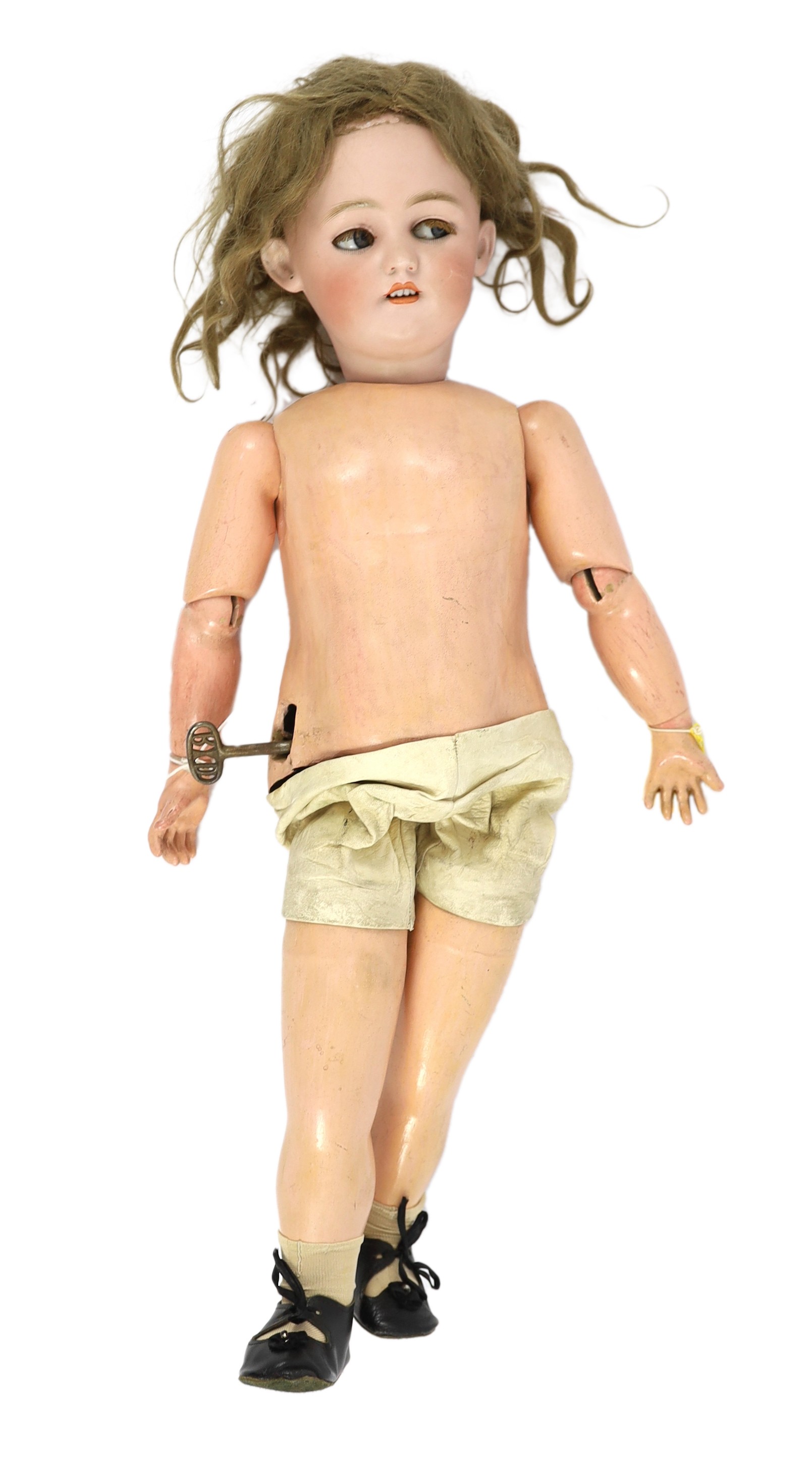 A Simon & Halbig bisque keywind walking doll, German, circa 1892, 24in.